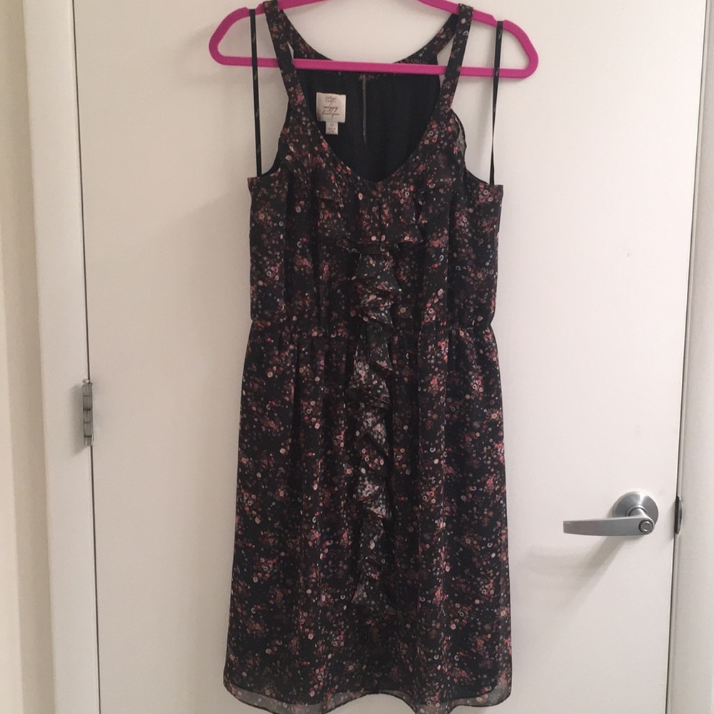 Floral dress with ruffle detail and cinched waist